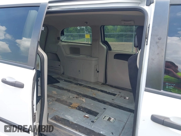 2014 Ram Cargo Van Tradesman with VIN 2C4RRGAGXER459213, listed as a IAAI auction lot 42590594 with 174,217 mi miles and . Bid and sale history available at DreamBid. Image 8.
