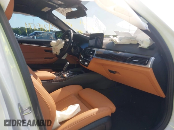 2023 BMW 5 Series 530i xDrive with VIN WBA13BJ07PCM67816, listed as a IAAI auction lot 42415174 with 19,993 mi miles and . Bid and sale history available at DreamBid. Image 5.