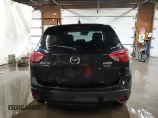 2015 Mazda CX-5 Touring with VIN JM3KE4CY1F0458911, listed as a Copart auction lot 87666255 with 0 mi miles and Salvage Title. Bid and sale history available at carsss.com. Image 6.