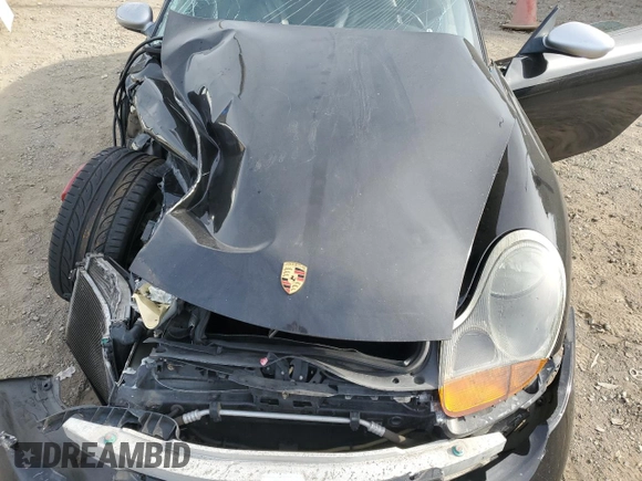 2000 Porsche Boxster z VIN WP0CA2984YU627674, wystawiony jako Copart lot #86027054 z przebiegiem 112 153 mil mil oraz Szkoda całkowita • Salvage title. Historia ofert i sprzedaży dostępna na DreamBid. Obrazek 13.