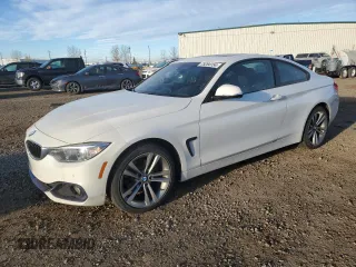 2014 BMW 4 Series 428i xDrive with VIN WBA3N5C57EK196028, listed as a Copart auction lot 75284154 with 71,071 mi miles and Clean title. Bid and sale history available at DreamBid. Image 1.