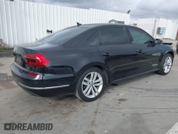 2019 Volkswagen Passat 2.0T Wolfsburg Edition with VIN 1VWLA7A34KC012887, listed as a IAAI auction lot 41792604 with 70,237 mi miles. Bid and sale history available at carsss.com. Image 4.