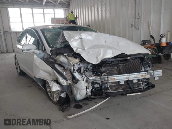 2013 Ford Fusion SE Hybrid with VIN 3FA6P0LU8DR357054, listed as a IAAI auction lot 42372168 with 143,979 mi miles and . Bid and sale history available at DreamBid. Image 1.