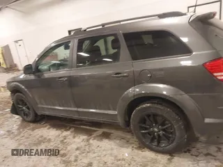 2020 Dodge Journey SE Value with VIN 3C4PDCAB7LT261279, listed as a IAAI auction lot 41564096 with 67,388 mi miles and . Bid and sale history available at DreamBid. Image 14.