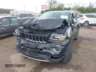 2014 Jeep Grand Cherokee Limited z VIN 1C4RJFBG9EC181218, wystawiony jako IAAI lot #42088591 z przebiegiem 159 909 mil mil oraz . Historia ofert i sprzedaży dostępna na DreamBid. Obrazek 16.