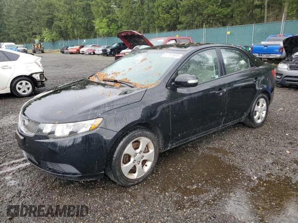 2010 Kia Forte EX z VIN KNAFU4A24A5251210, wystawiony jako Copart lot #57707605 z przebiegiem 165 166 mil mil oraz Czysty tytuł • Clean title. Historia ofert i sprzedaży dostępna na DreamBid. Obrazek 1.