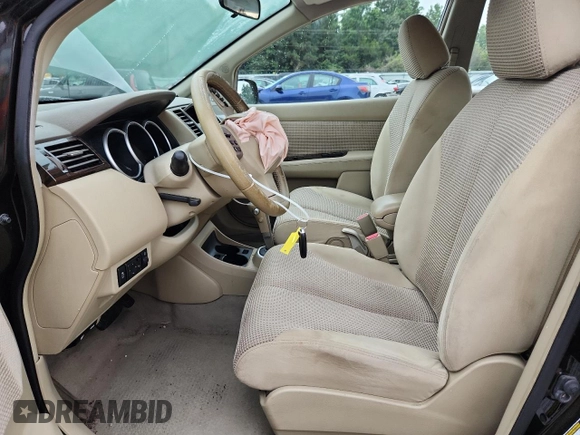 2010 Nissan Versa SL with VIN 3N1BC1CP1AL458944, listed as a Copart auction lot 64221065 with 131,163 mi miles and Salvage title. Bid and sale history available at DreamBid. Image 7.