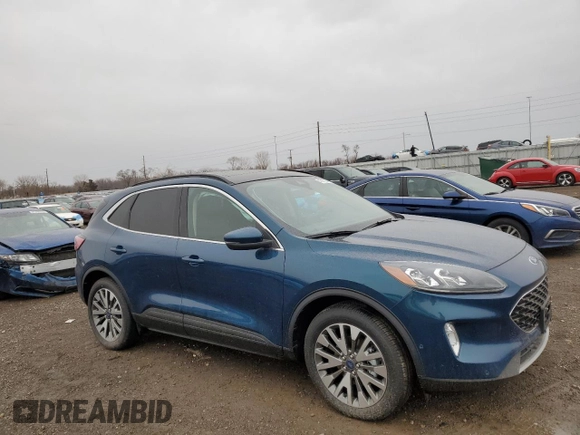 2020 Ford Escape Titanium Hybrid z VIN 1FMCU9DZXLUB95757, wystawiony jako Copart lot #47472845 z przebiegiem 39 622 mil mil oraz Szkoda całkowita • Salvage title. Historia ofert i sprzedaży dostępna na DreamBid. Obrazek 4.