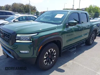 2024 Nissan Frontier SL with VIN 1N6ED1EJ0RN602640, listed as a IAAI auction lot 42465622 with 29,368 mi miles and . Bid and sale history available at DreamBid. Image 2.