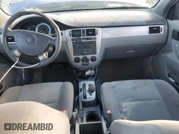 2006 Suzuki Forenza z VIN KL5JD56Z96K478173, wystawiony jako Copart lot #87059644 z przebiegiem 234 059 mil mil oraz Szkoda całkowita • Salvage title. Historia ofert i sprzedaży dostępna na DreamBid. Obrazek 8.