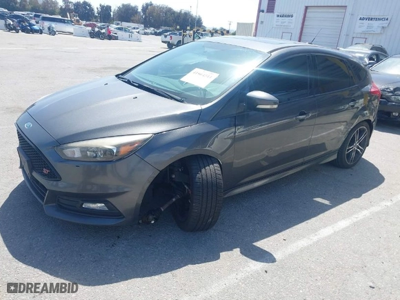 2015 Ford Focus ST with VIN 1FADP3L94FL241243, listed as a IAAI auction lot 41964511 with 97,259 mi miles. Bid and sale history available at carsss.com. Image 2.
