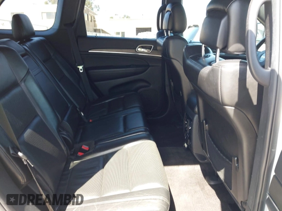 2018 Jeep Grand Cherokee Limited with VIN 1C4RJFBG3JC245943, listed as a IAAI auction lot 42287279 with 107,719 mi miles and . Bid and sale history available at DreamBid. Image 8.