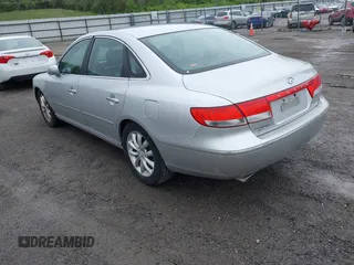 2007 Hyundai Azera SE with VIN KMHFC46FX7A182410, listed as a IAAI auction lot 42150993 with 146,627 mi miles and . Bid and sale history available at DreamBid. Image 3.