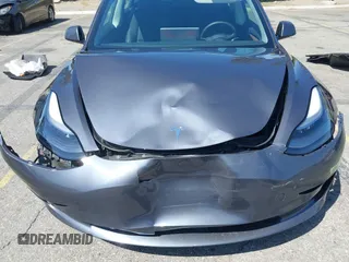 2023 Tesla Model 3 Long Range with VIN 5YJ3E1EB4PF635328, listed as a IAAI auction lot 41978099 with 32,747 mi miles and . Bid and sale history available at DreamBid. Image 19.