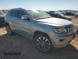 2018 Jeep Grand Cherokee Overland with VIN 1C4RJFCG8JC418368, listed as a Copart auction lot 50014005 with 34,287 mi miles and Salvage Title. Bid and sale history available at carsss.com. Image 4.