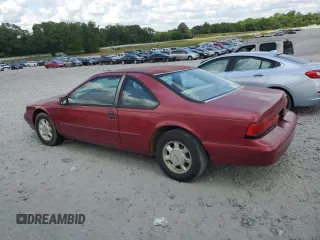 1995 Ford Thunderbird LX with VIN 1FALP6245SH140633, listed as a Copart auction lot 54914685 with 65,451 mi miles and Clean Title. Bid and sale history available at DreamBid. Image 2.