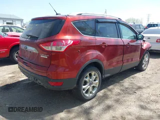 2015 Ford Escape Titanium with VIN 1FMCU0J92FUA38616, listed as a IAAI auction lot 42136816 with 131,941 mi miles and . Bid and sale history available at DreamBid. Image 4.