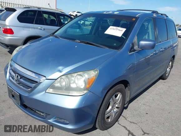 2006 Honda Odyssey EX-L z VIN 5FNRL38706B075356, wystawiony jako IAAI lot #42021960 z przebiegiem 120 455 mil mil oraz . Historia ofert i sprzedaży dostępna na DreamBid. Obrazek 18.