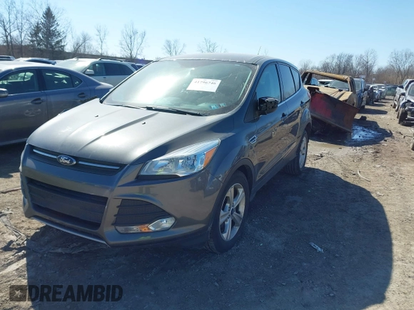 2016 Ford Escape SE with VIN 1FMCU0G73GUC76322, listed as a IAAI auction lot 41796746 with 61,821 mi miles. Bid and sale history available at carsss.com. Image 2.
