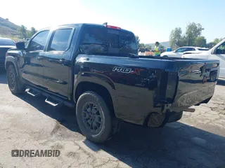 2023 Nissan Frontier Pro-X with VIN 1N6ED1EJ6PN619651, listed as a IAAI auction lot 41838415 with 69,819 mi miles and . Bid and sale history available at DreamBid. Image 3.