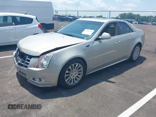 2013 Cadillac CTS Performance with VIN 1G6DK5E31D0146699, listed as a IAAI auction lot 42426214 with 96,520 mi miles and . Bid and sale history available at DreamBid. Image 2.