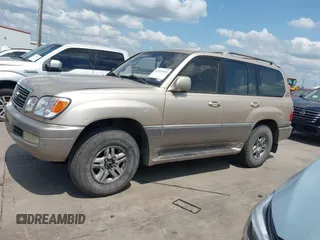 2001 Lexus LX 470 with VIN JTJHT00W713511796, listed as a IAAI auction lot 42222574 with 297,427 mi miles and . Bid and sale history available at carsss.com. Image 14.