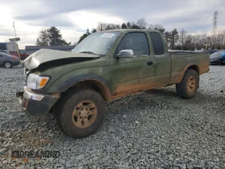 1999 Toyota Tacoma with VIN 4TAWN74N1XZ484272, listed as a Copart auction lot 86520434 with 319,321 mi miles and Salvage title. Bid and sale history available at DreamBid. Image 1.