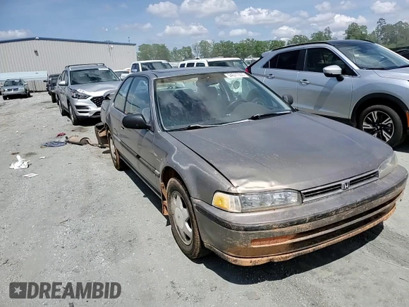 1992 Honda Accord z VIN 1HGCB7277NA019206, wystawiony jako Copart lot #54077035 z przebiegiem 227 766 mil mil oraz Szkoda całkowita • Salvage title. Historia ofert i sprzedaży dostępna na DreamBid. Obrazek 13.