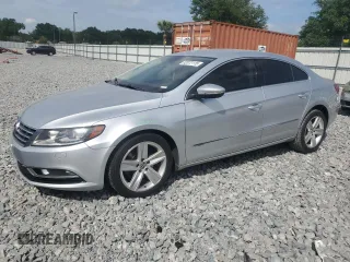 2013 Volkswagen CC Sport Plus z VIN WVWBP7ANXDE567669, wystawiony jako Copart lot #52072115 z przebiegiem 55 823 mil mil oraz Szkody całkowita. Historia ofert i sprzedaży dostępna na DreamBid. Obrazek 1.