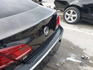 2014 Volkswagen CC R-Line with VIN WVWBN7ANXEE521055, listed as a IAAI auction lot 41197539 with 94,902 mi miles. Bid and sale history available at carsss.com. Image 18.