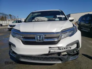 2021 Honda Pilot Touring 8-Passenger with VIN 5FNYF5H94MB001855, listed as a Copart auction lot 87891185 with 55,097 mi miles and Salvage Title. Bid and sale history available at DreamBid. Image 5.