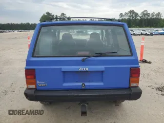 1996 Jeep Cherokee Sport z VIN 1J4FT68S8TL128381, wystawiony jako Copart lot #57496175 z przebiegiem 221 330 mil mil oraz Szkoda całkowita • Salvage title. Historia ofert i sprzedaży dostępna na DreamBid. Obrazek 6.