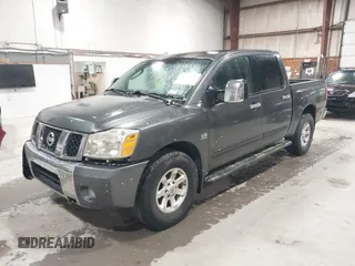 2004 Nissan Titan LE with VIN 1N6AA07B84N544745, listed as a IAAI auction lot 42195072 with 357,986 mi miles. Bid and sale history available at carsss.com. Image 2.
