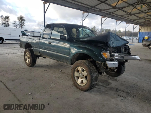 1996 Toyota Tacoma with VIN 4TAWM72N4TZ103661, listed as a Copart auction lot 86506054 with 197,518 mi miles and Salvage title. Bid and sale history available at DreamBid. Image 4.