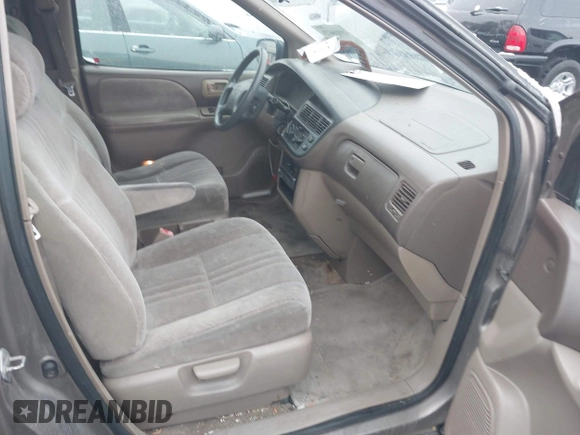 1999 Toyota Sienna LE with VIN 4T3ZF13C9XU164032, listed as a IAAI auction lot 41916673 with 296,628 mi miles and . Bid and sale history available at DreamBid. Image 5.