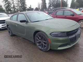 2021 Dodge Charger SXT with VIN 2C3CDXBG7MH681655, listed as a IAAI auction lot 41689007 with 66,036 mi miles and . Bid and sale history available at DreamBid. Image 1.