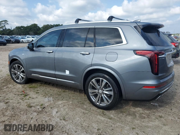 2021 Cadillac XT6 Premium Luxury with VIN 1GYKPCRS5MZ198953, listed as a Copart auction lot 67291154 with 0 mi miles and Salvage Title. Bid and sale history available at carsss.com. Image 2.