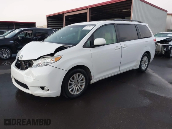 2014 Toyota Sienna XLE with VIN 5TDYK3DC1ES429932, listed as a IAAI auction lot 41692134 with 93,625 mi miles. Bid and sale history available at carsss.com. Image 18.