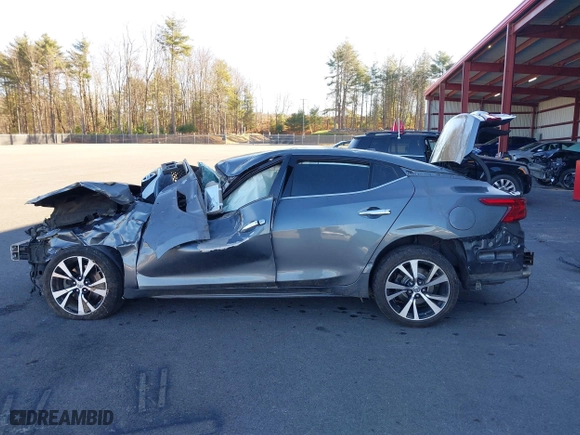 2018 Nissan Maxima SL with VIN 1N4AA6AP2JC377077, listed as a IAAI auction lot 40780334 with 77,366 mi miles. Bid and sale history available at carsss.com. Image 14.