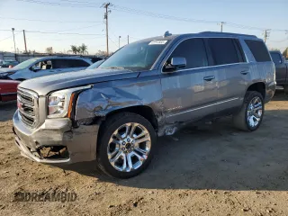 2018 GMC Yukon SLT with VIN 1GKS1BKC9JR338958, listed as a Copart auction lot 43252885 with 80,647 mi miles and Salvage Title. Bid and sale history available at carsss.com. Image 1.