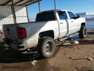 2017 Chevrolet Silverado 1500 High Country with VIN 3GCUKTEJ7HG136177, listed as a IAAI auction lot 41275183 with 163,380 mi miles. Bid and sale history available at carsss.com. Image 4.