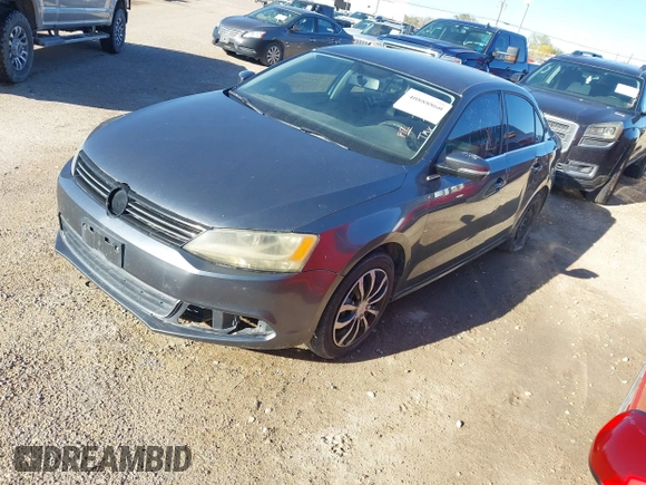 2013 Volkswagen Jetta SE with VIN 3VWDX7AJ1DM411050, listed as a IAAI auction lot 40888860 with 57,938 mi miles and . Bid and sale history available at DreamBid. Image 2.