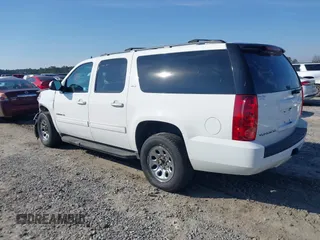 2014 GMC Yukon XL SLT with VIN 1GKS1KE09ER116590, listed as a IAAI auction lot 41459319 with 246,958 mi miles. Bid and sale history available at carsss.com. Image 3.