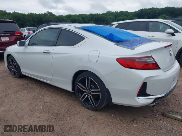 2016 Honda Accord Touring with VIN 1HGCT2B09GA007614, listed as a IAAI auction lot 42532621 with 200,935 mi miles and . Bid and sale history available at DreamBid. Image 3.