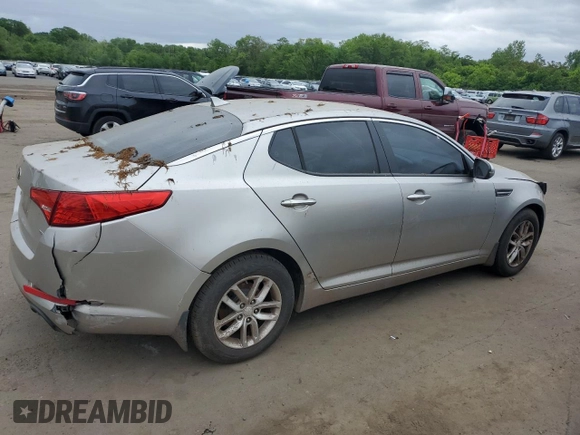 2013 Kia Optima LX z VIN 5XXGM4A7XDG171218, wystawiony jako Copart lot #56296335 z przebiegiem Nie podano mil oraz Czysty tytuł • Clean title. Historia ofert i sprzedaży dostępna na DreamBid. Obrazek 3.