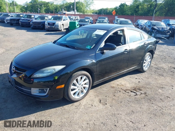 2012 Mazda 6 i Touring with VIN 1YVHZ8DH2C5M23669, listed as a IAAI auction lot 42247758 with 123,389 mi miles and . Bid and sale history available at DreamBid. Image 2.