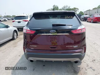 2019 Ford Edge Titanium with VIN 2FMPK4K96KBB20247, listed as a IAAI auction lot 42450212 with 121,756 mi miles and . Bid and sale history available at DreamBid. Image 16.