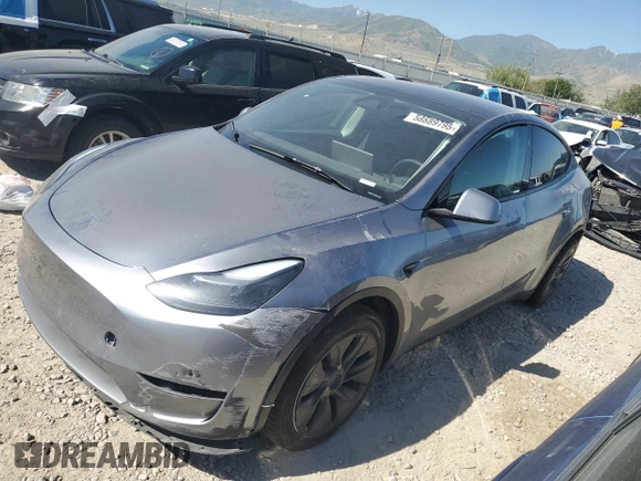 2024 Tesla Model Y Long Range with VIN 7SAYGDEE6RA321064, listed as a Copart auction lot 58889795 with 48,857 mi miles and Salvage title. Bid and sale history available at DreamBid. Image 1.