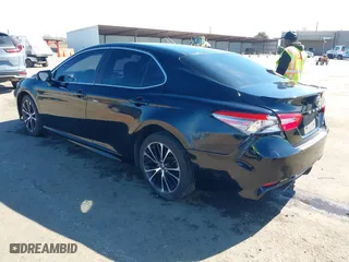 2018 Toyota Camry LE with VIN JTNB11HKXJ3071137, listed as a IAAI auction lot 41699856 with 102,310 mi miles. Bid and sale history available at carsss.com. Image 3.