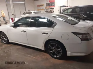 2014 Nissan Maxima SV z VIN 1N4AA5APXEC478724, wystawiony jako IAAI lot #41335407 z przebiegiem 161 985 mil mil oraz . Historia ofert i sprzedaży dostępna na DreamBid. Obrazek 14.